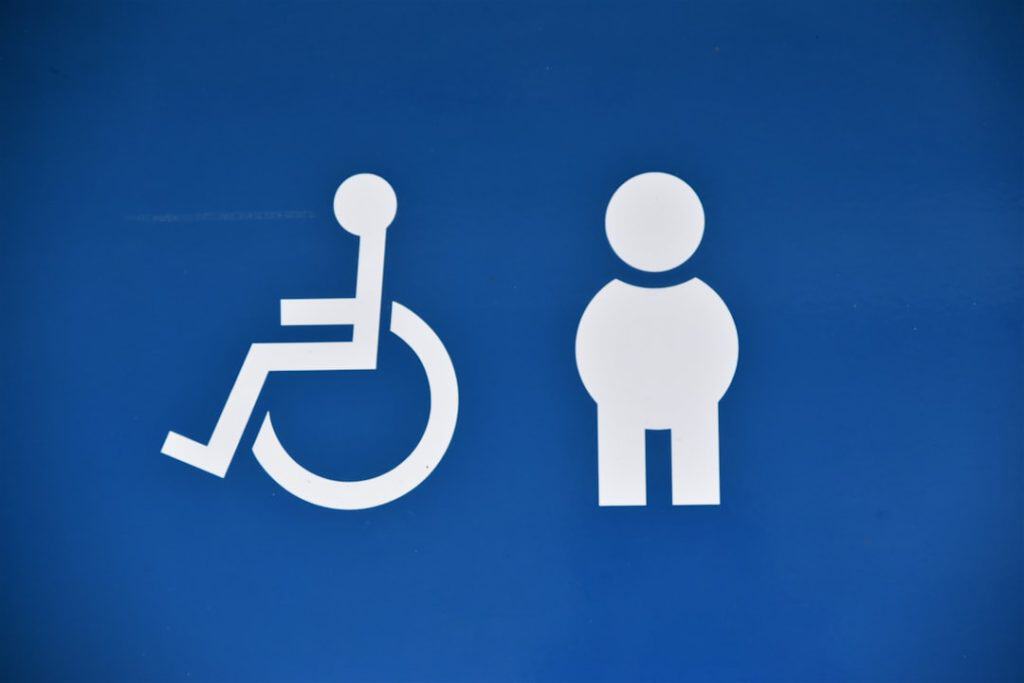 Fighting Disability Discrimination: Hire a Lawyer Today 7 Photo Image: Gavel, wheelchair